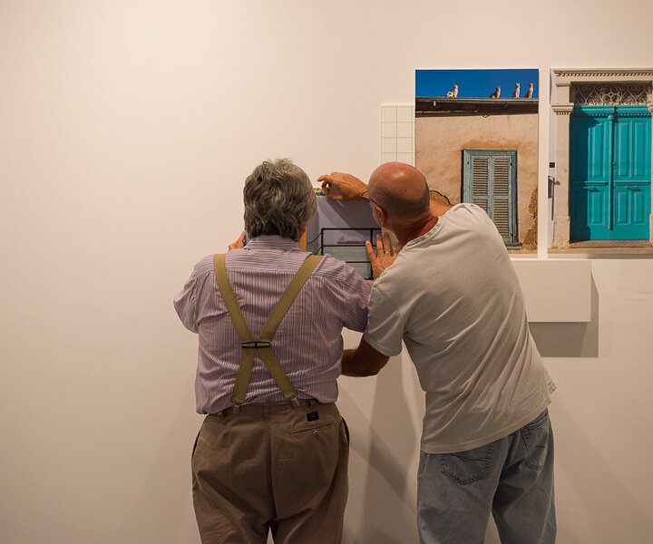_DSC1792 Setting up photos for the photo exhibition.