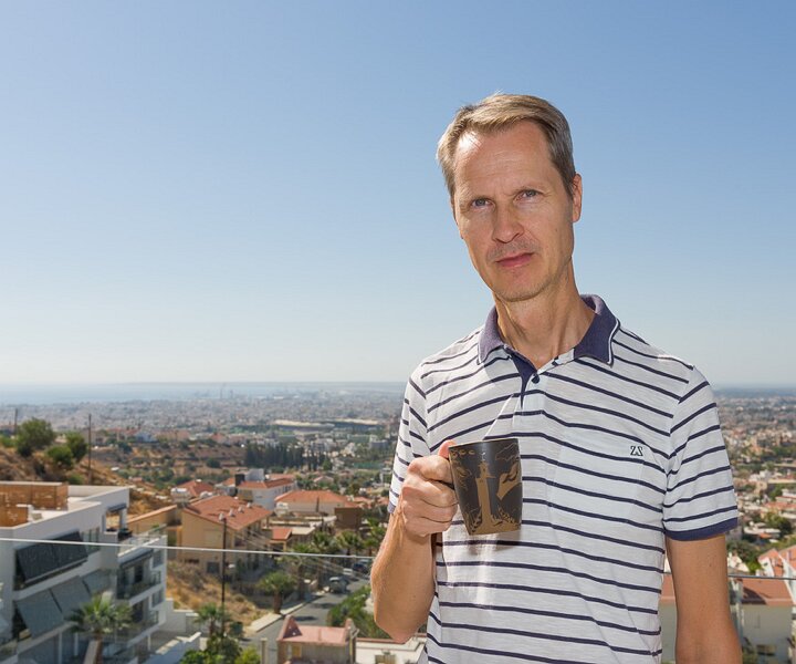 _DSC7114 Arto having coffee on the veranda of the apartment in Limassol.