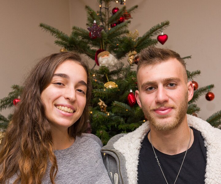 _DSC7165 Ingrid and Iakovos by the Christmas tree.