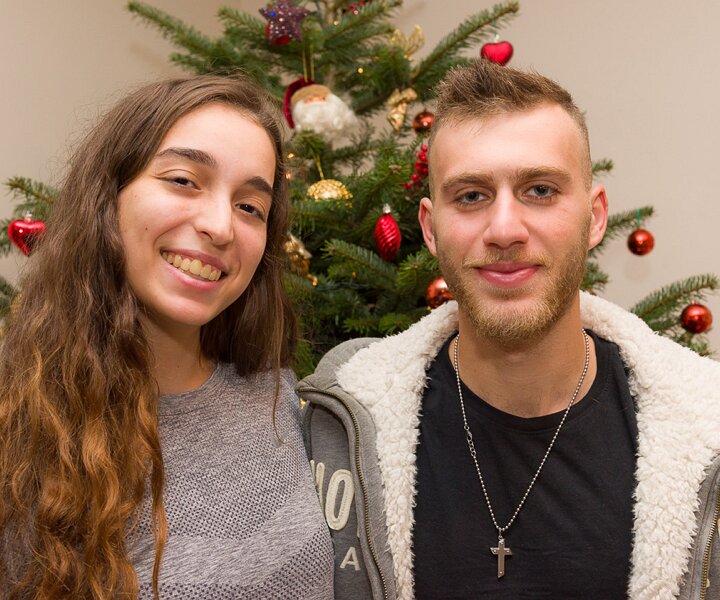 _DSC7168 Ingrid and Iakovos by the Christmas tree.