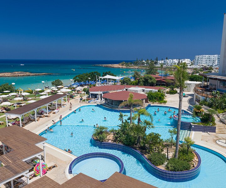 _DSC0056 View over the pool area and Fig Tree Bay from the hotel room at Capo Bay hotel.