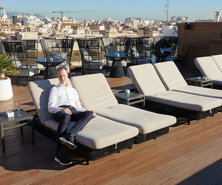_DSC1902 Arto enjoying the sun on the rooftop terrace at Nakar hotel in Palma.